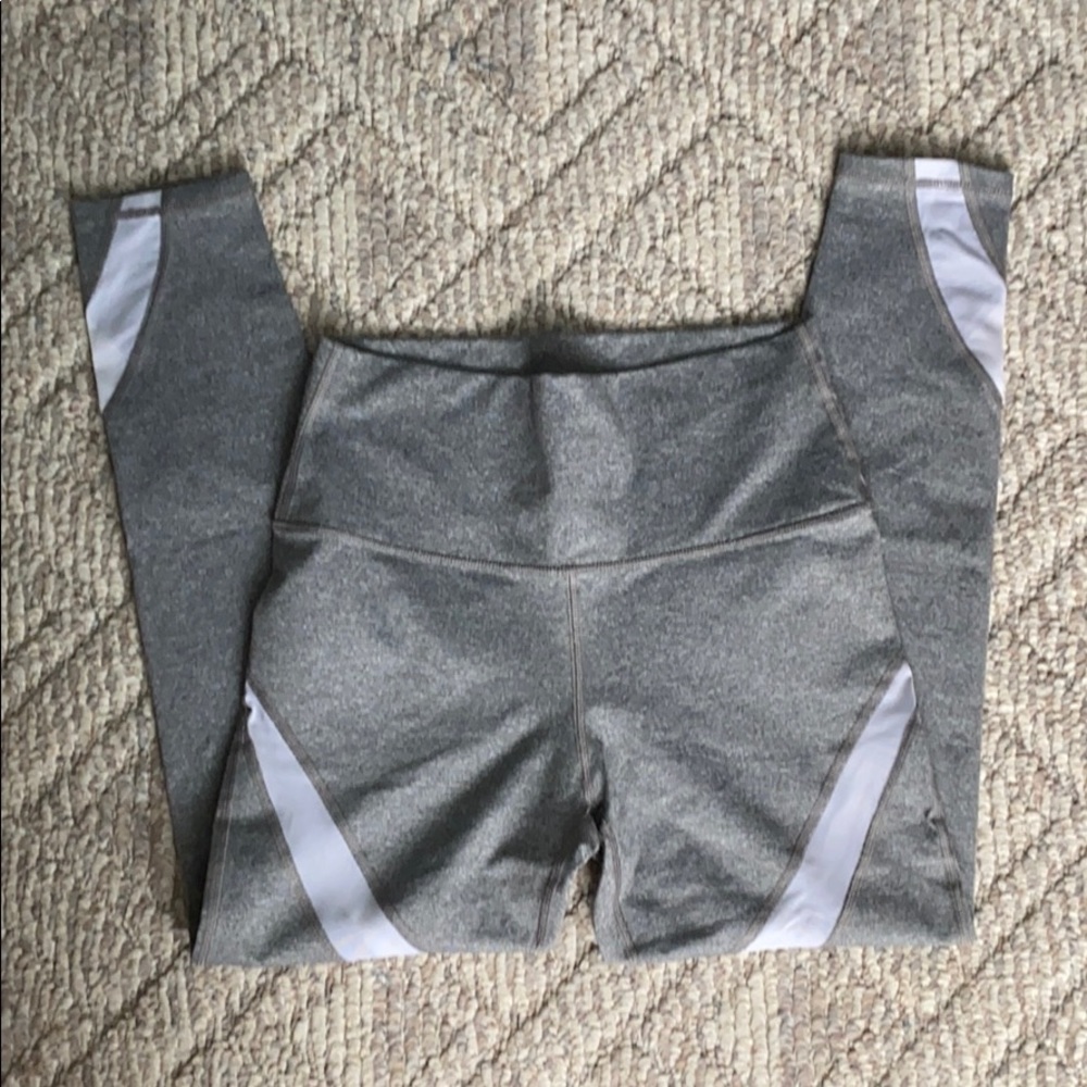 Gray leggings with white mesh inserts